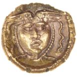 Tincomarus Medusa. Regini & Atrebates. c.25BC-AD10. Celtic gold quarter stater. 10mm. 1.10g.
