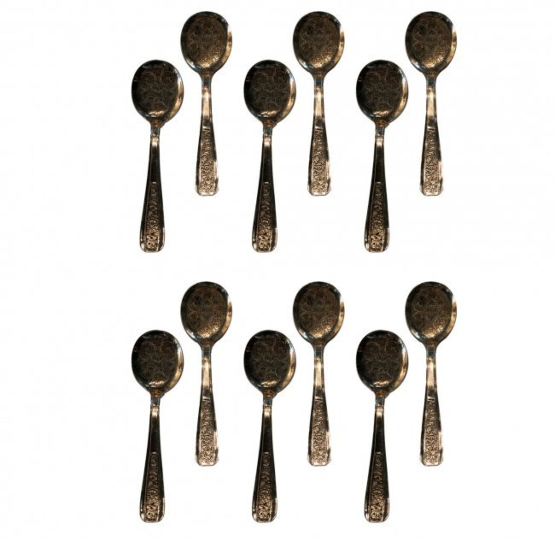 Set of silver dessert spoons