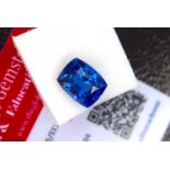 BLUE STONE WITH CARD MARKED SAPPHIRE
