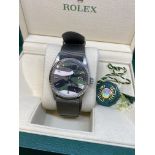 Rolex Stainless Steel with Gold Bezel - Camouflage Dial  Comes boxed, Dial & Strap most likely