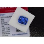 BLUE STONE WITH CARD MARKED SAPPHIRE