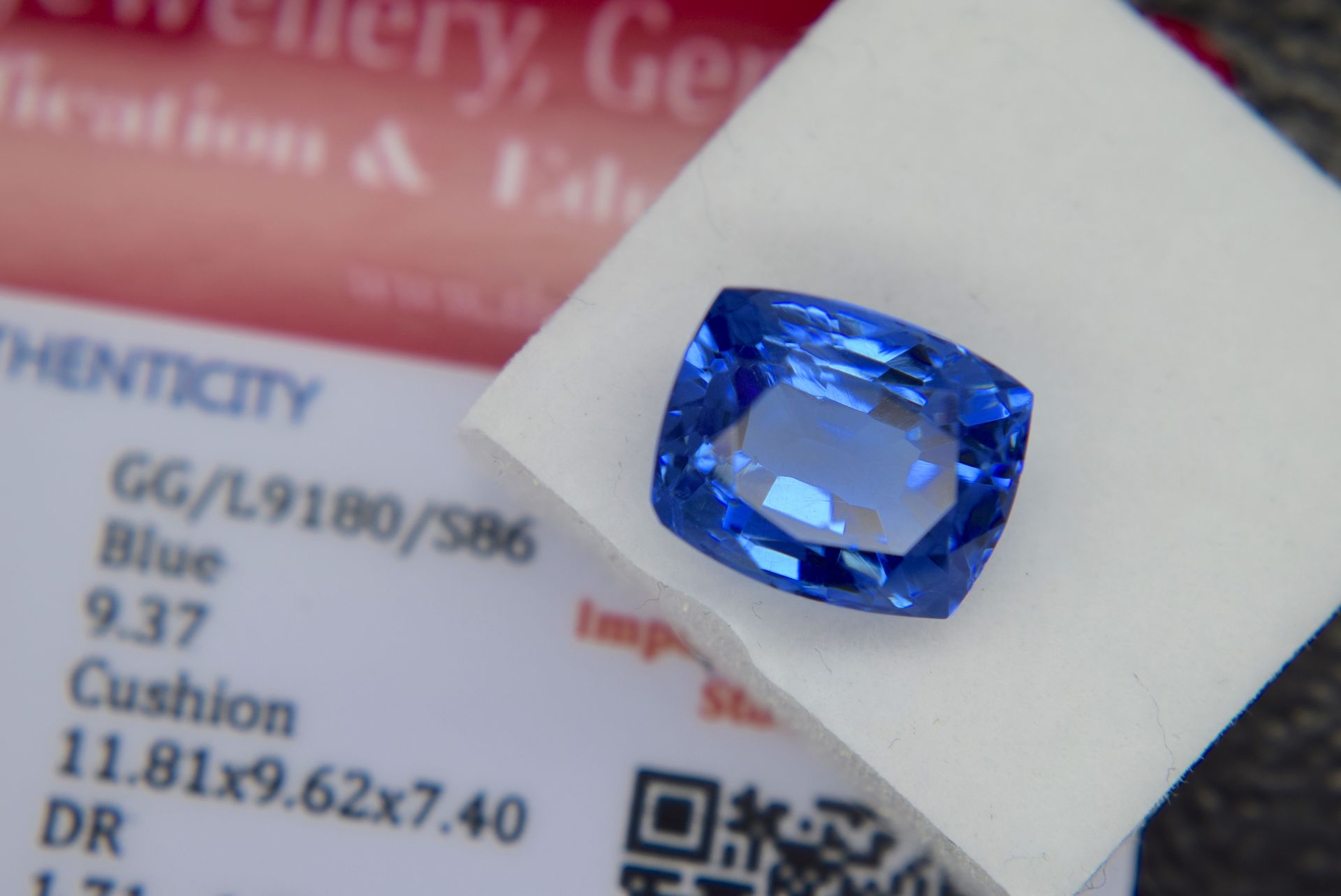 BLUE STONE WITH CARD MARKED SAPPHIRE