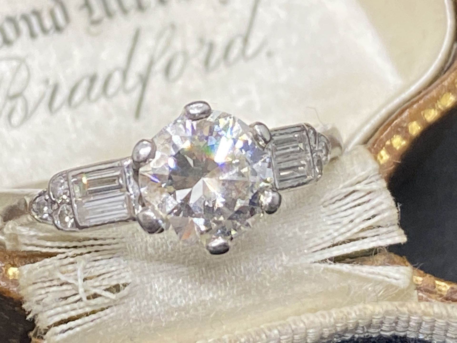 VINTAGE PLATINUM DIAMOND SOLITAIRE WITH DIAMOND BAGUETTE SHOULDERS 1.40ct TOTAL DIAMOND WEIGHT