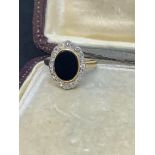 18ct GOLD BLACK ONYX & 0.60ct DIAMOND RING - 4 GRAMS