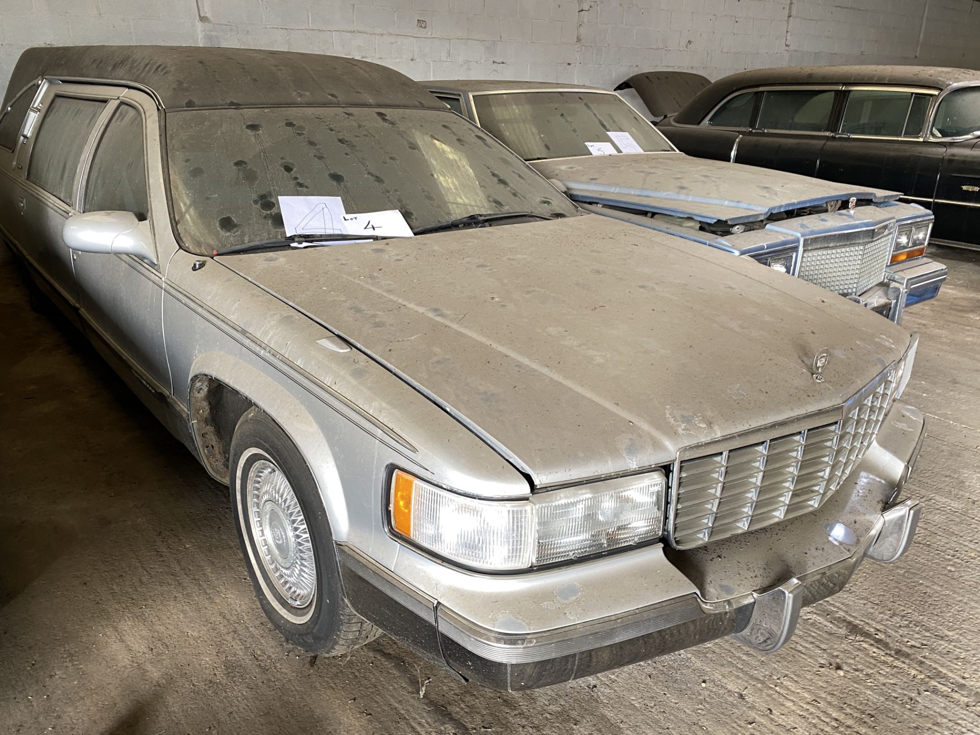 APPROX 1996 CADILLAC HEARSE IN SILVER WITH KEYS