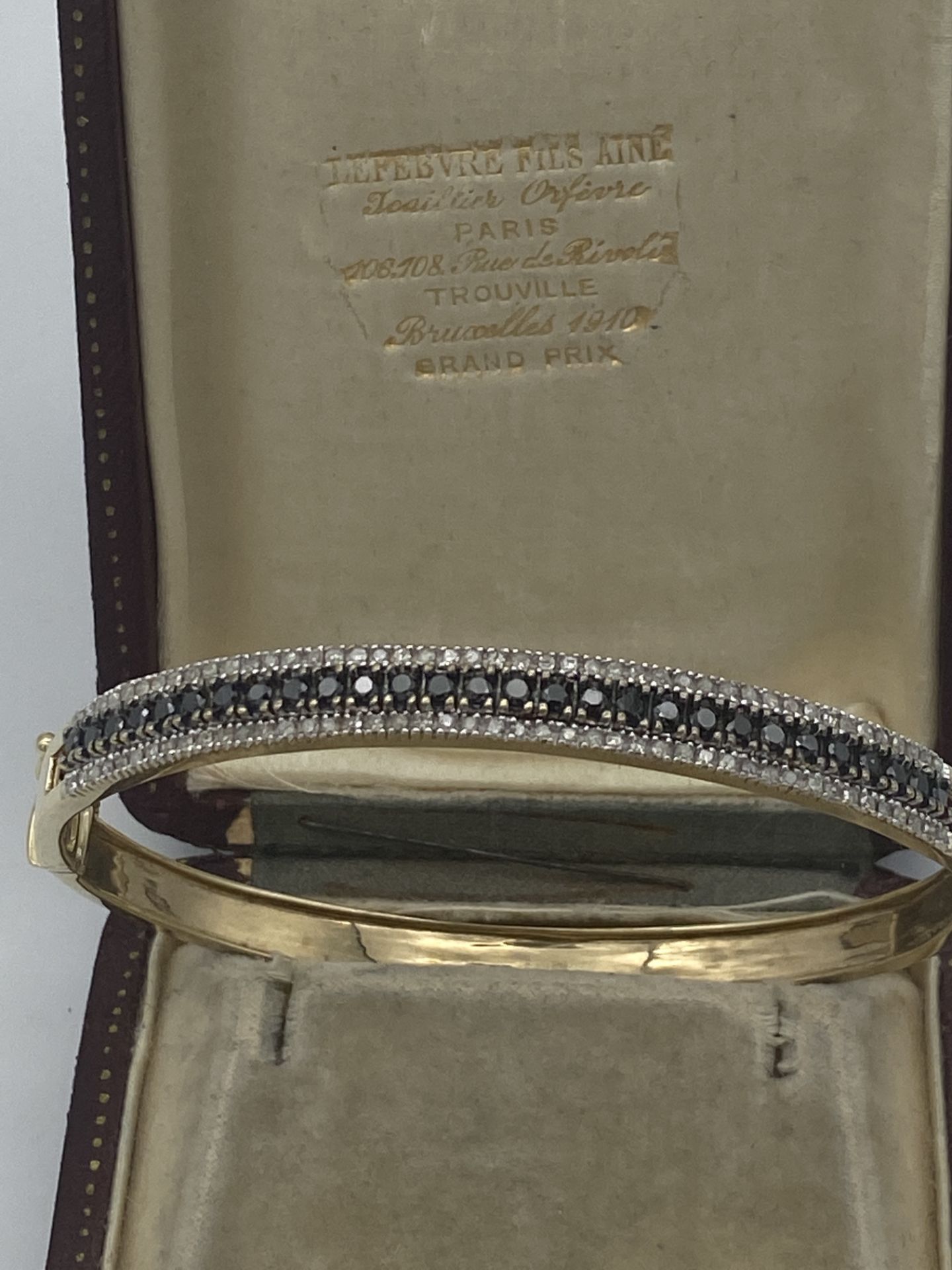 9ct GOLD BLACK & WHITE DIAMOND SET BANGLE