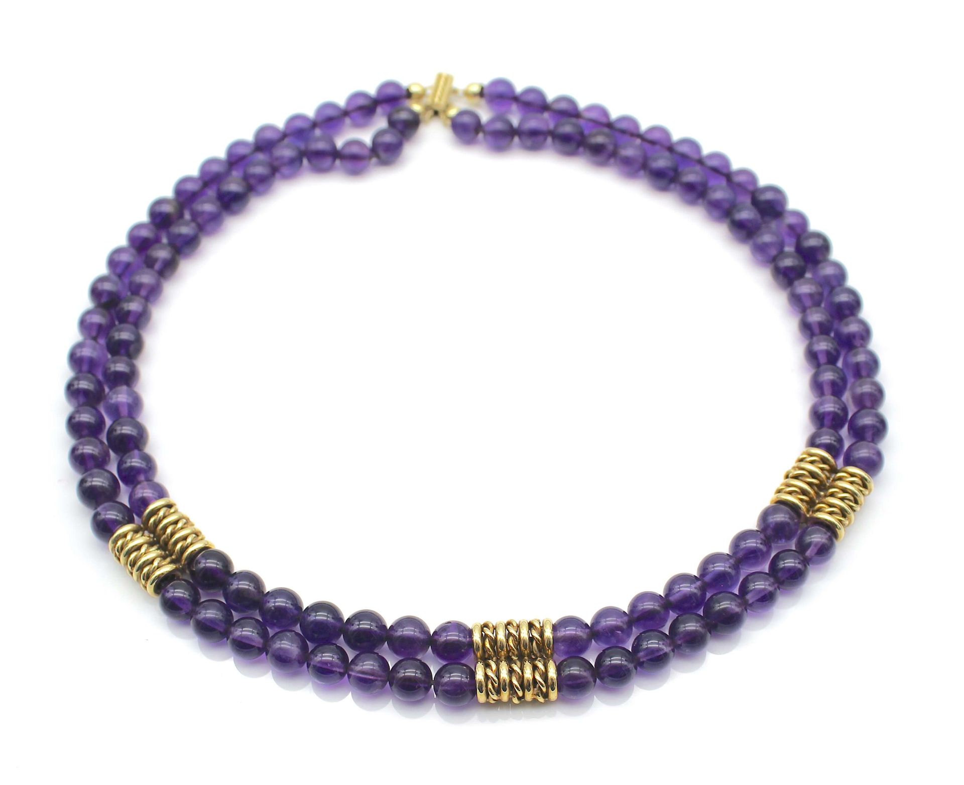 Kette mit 2 Reihen Amethystkugel. Schloß und Einsätze aus 585er Gold