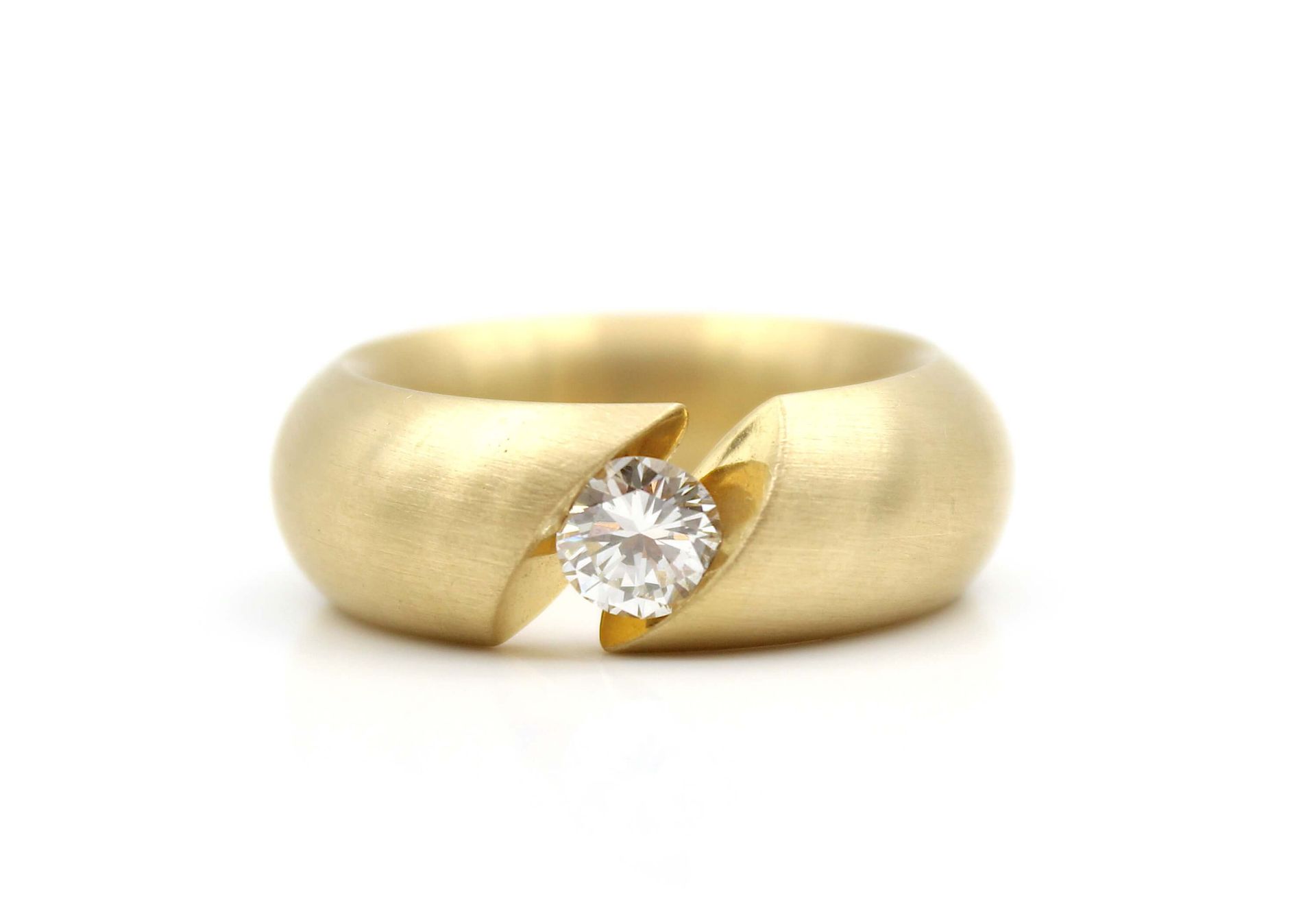 Niessing Ring aus 750er, mattierten Gold mit einem Brillanten, 1,01 ct