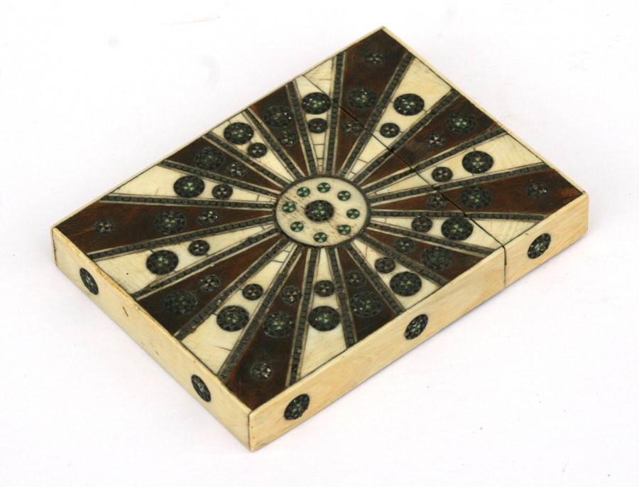 A late 19th century Anglo Indian ebony and ivory visiting card case, 8cms (3ins) wide.