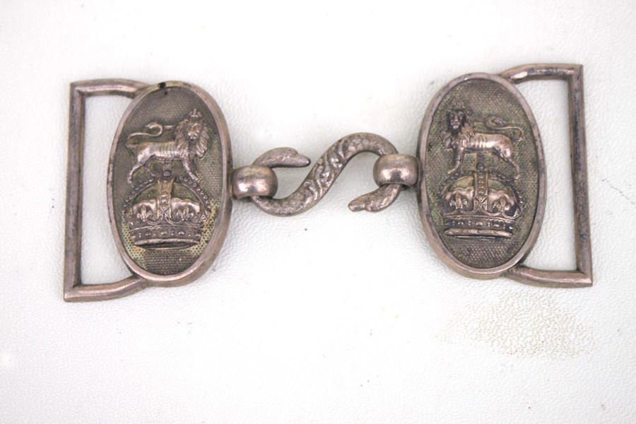 An early 20th century Royal Navy officers white metal belt buckle with snake clasp. Overall width