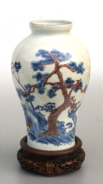 A Chinese blue & copper red baluster vase decorated with landscape scene, six character mark to