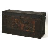 A 18th / 19th century Tibetan tiger skin and leather bound trunk with metal strapwork decoration, (