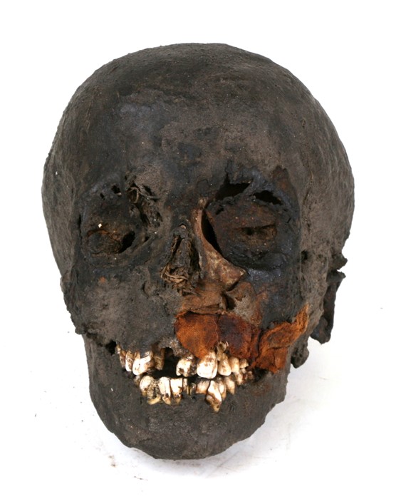 An Egyptian mummified human head, approx 19cms (7.48ins) long. Purchased by the vendor from a - Image 2 of 6