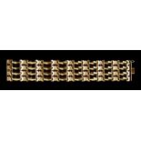 An 18ct gold articulated cuff bracelet, weight 47g. 19.5cm long 3cm wideCondition Reportgood overall