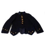 A blue cloth Piper's jacket with brass buttons.