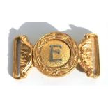 A 19th century silver "E" on gilt belt buckle clasp (E Company?) 9cms (3.5ins) overall width