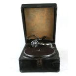 A His Master's Voice portable gramophone player.