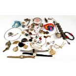 A quantity of assorted costume jewellery, watches and other items to include a military badge.