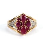 A 9ct gold ruby and diamond ring, approx UK size 'N', 5.3g.Condition Report The rubies are