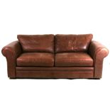 A modern brown leather three-seater sofa (reputedly bought from Habitat) 213cms (84ins) wide.