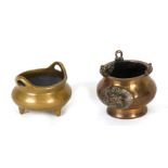 A Chinese polished bronze two-handled tripod censer with four character mark to the underside, 11cms