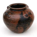 A British Studio Pottery vase with four lug handles in Tenmoku glaze, impressed potters mark