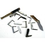 A quantity of pen & pocket knives to include mother of pearl examples.