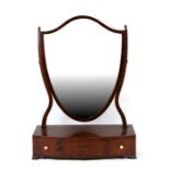 A Victorian mahogany shield shaped toilet mirror.