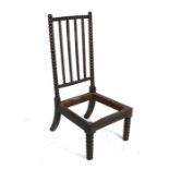 A Victorian oak bobbin turned chair frame.