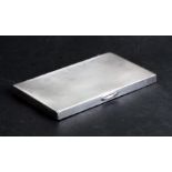 A silver cigarette case with engine turned decoration, A Wilcox, Birmingham 1938, weight 240g, 13.