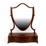 A Victorian mahogany shield shaped toilet mirror.