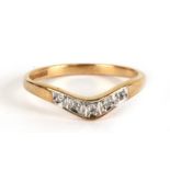 A 9ct gold diamond set wishbone ring, approx UK size 'N', 1.8g.