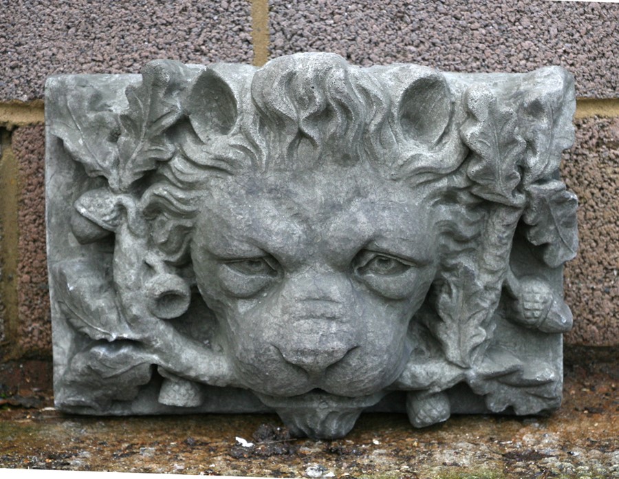 A concrete lion fountain head, 44cms (17.25ins) wide.Condition ReportSome minor scratches to his