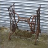 A cast iron Singer sewing machine treadle table base, 60cms (23.75ins) wide.