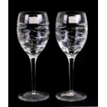 A pair of Waterford Crystal 'Rain' cut glass wine glasses, designed by Terence Conran, 23cms (