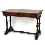 A Victorian oak serving table with twin frieze drawers above twin column supports, joined by a