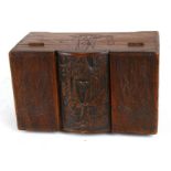 A small Chinese carved camphorwood chest, 30cms (12ins) wide.