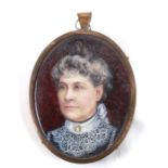 Victorian school, an oval bust portrait miniature depicting a distinguished lady wearing a lace