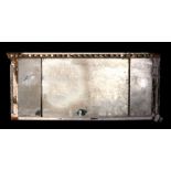 A Regency three-plate distressed overmantle mirror, 132cms (21.75ins) wide.