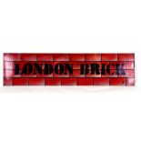 An enamel advertising sign - LONDON BRICK - 30 by 124cms (12 by 49ins).