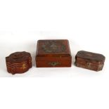 A late Victorian leather jewellery box of shaped rectangular form with bronze insect shaped clasp,