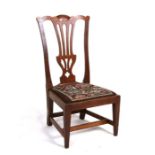 An early 20th century Scottish miniature Chippendale style child's chair by Wheeler of Arncroach,