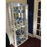 An Ikea glazed display cabinet, 86cms (34ins) wide. (not contents)