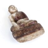A 19th century polychromed and gilt lacquered marble figure of Buddha, possibly Burmese, 26cms (10.