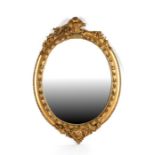 A 19th century gilt framed oval wall mirror, 52cms (20.5ins) wide.