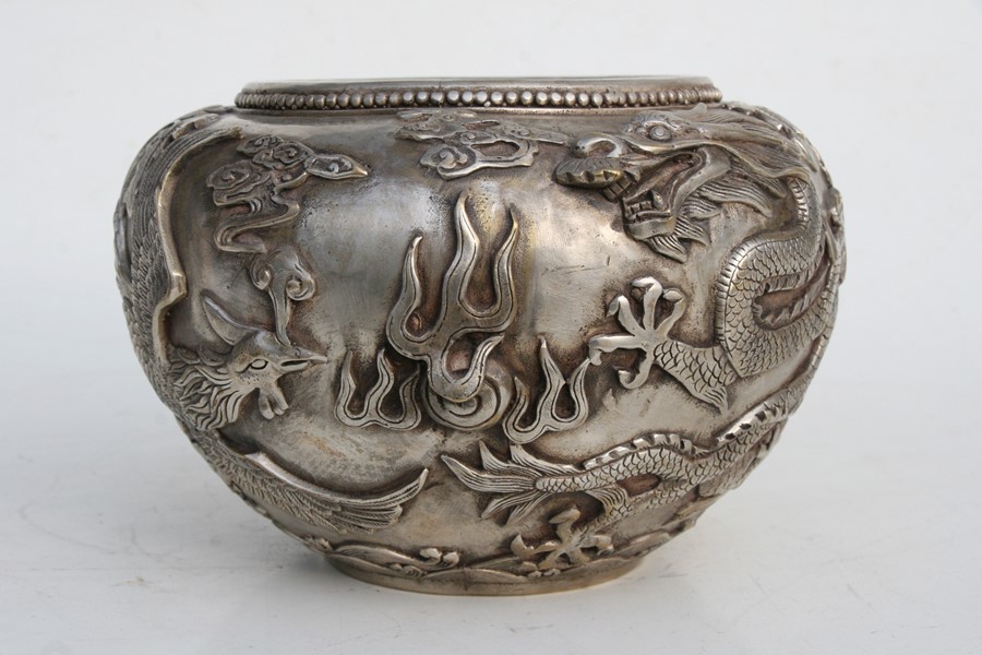 A large Chinese silvered bronze censer decorated in relief with a dragon and phoenix, four character - Image 9 of 12