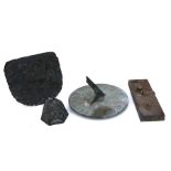 A bronze sundial, a brass door lack and other items.