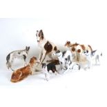 A quantity of porcelain Borzoi figures and similar items, the largest 33cms (13ins) high.Condition