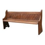 A pitch pine church pew, 183cms (72ins) wide.