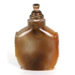 A Chinese agate snuff bottle, 8cms (3ins) high.